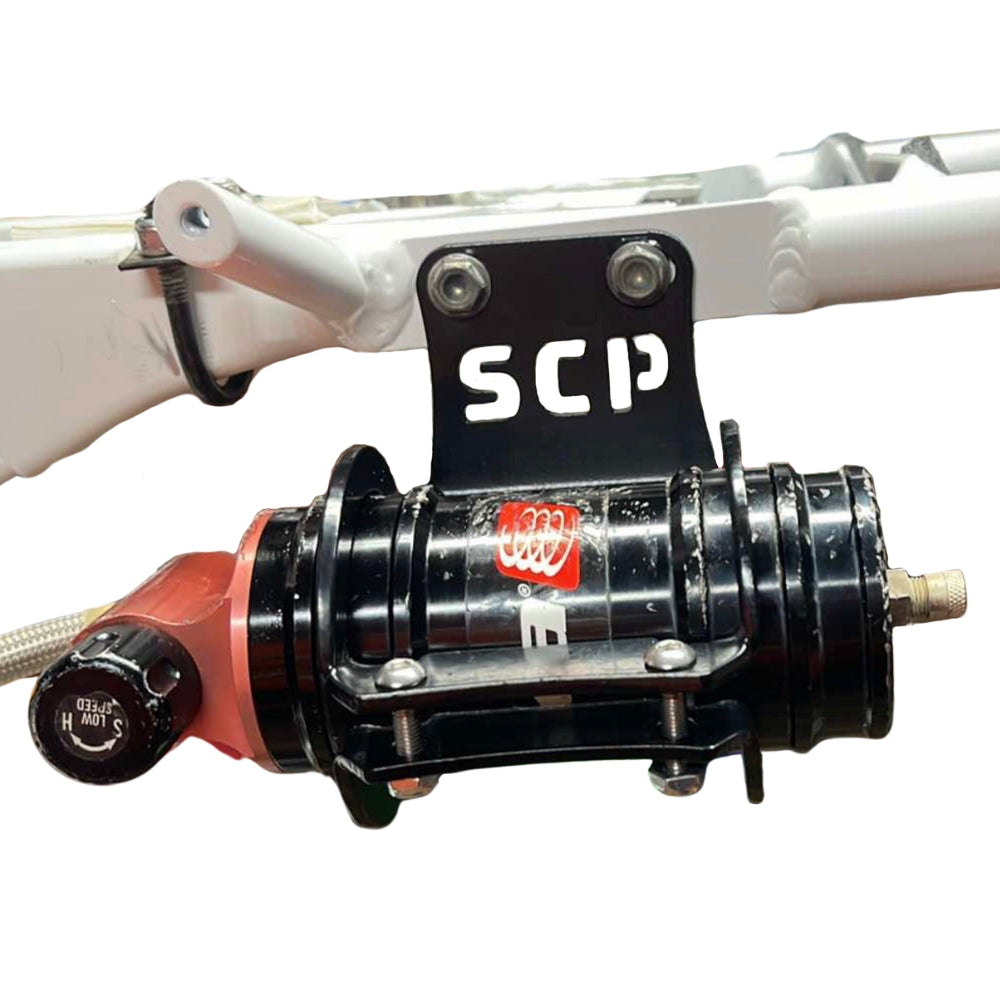 SCP Rear Shock Reservoir Mount – Pete Hager